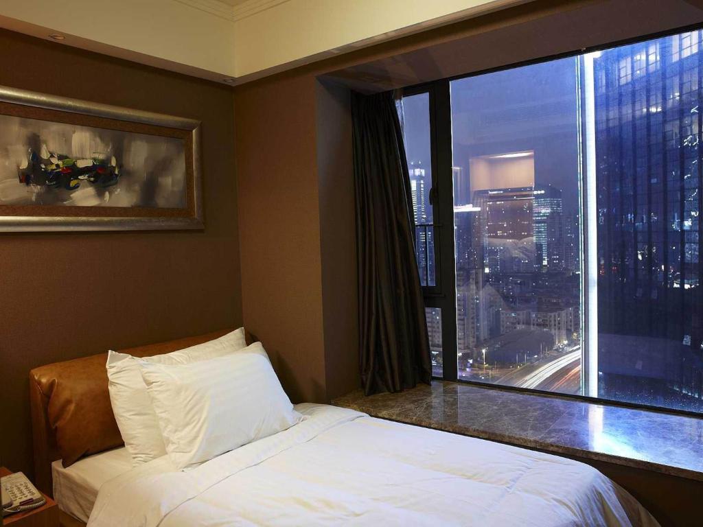 Dan Executive Hotel Apartment Zhujiang New Town Kanton Pokoj fotografie